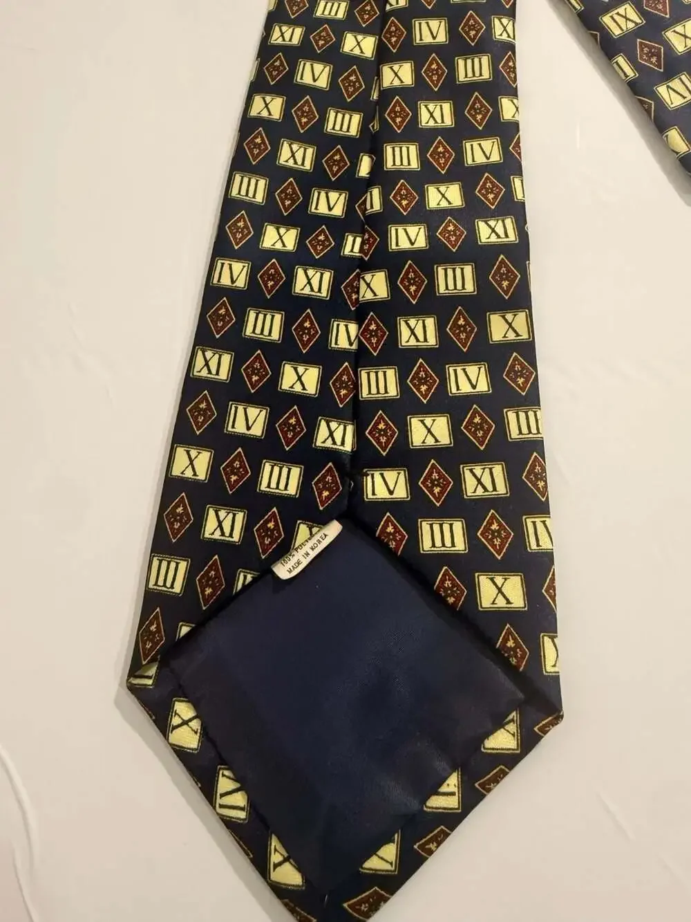 Dino Rowaro Hand Made Silk Tie with Roman Numeral and Diamond Pattern